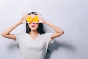 Girl with orange rounds