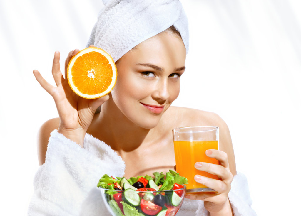 girl with salad and juice