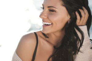 brunette girl laughing