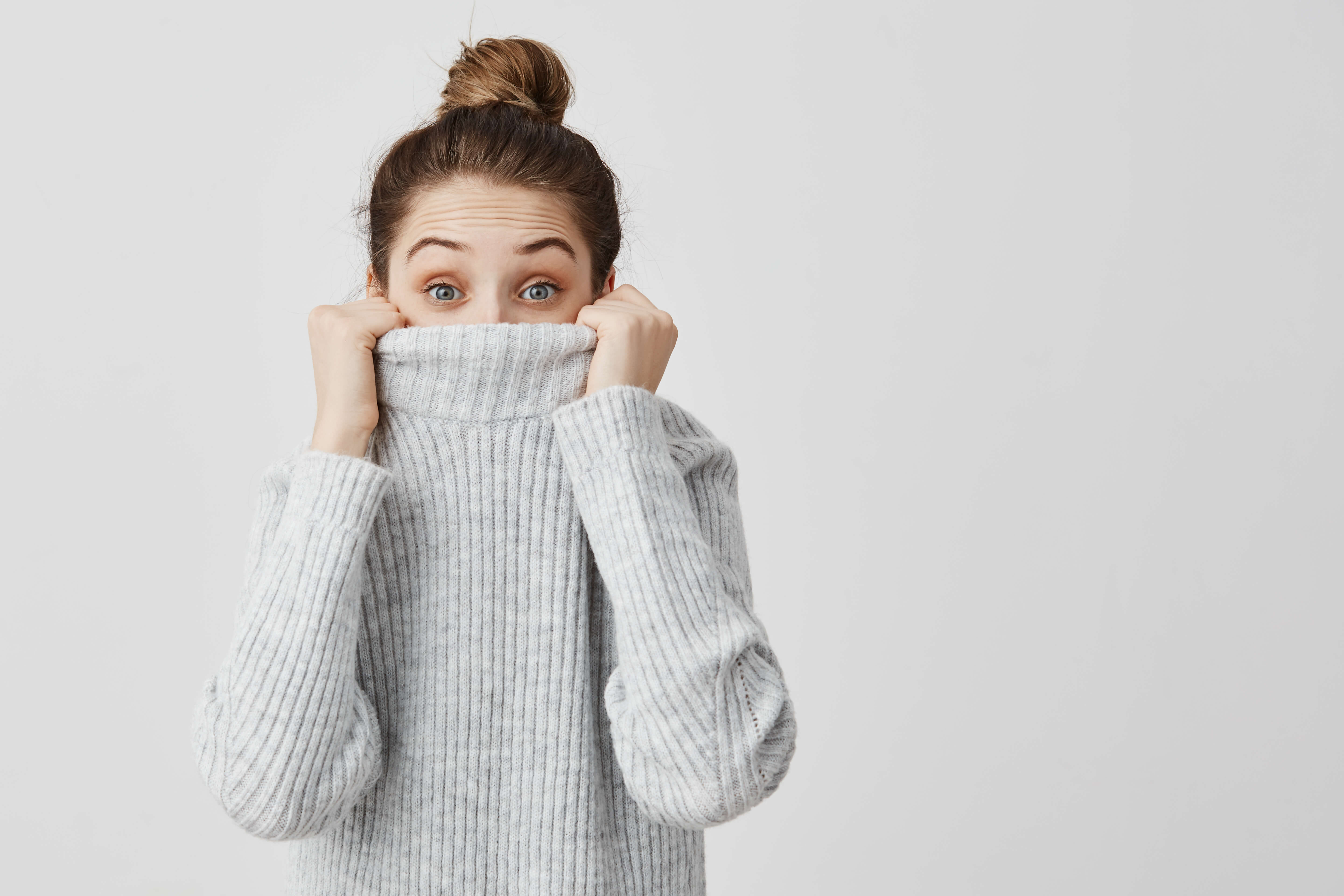 girl covering her face